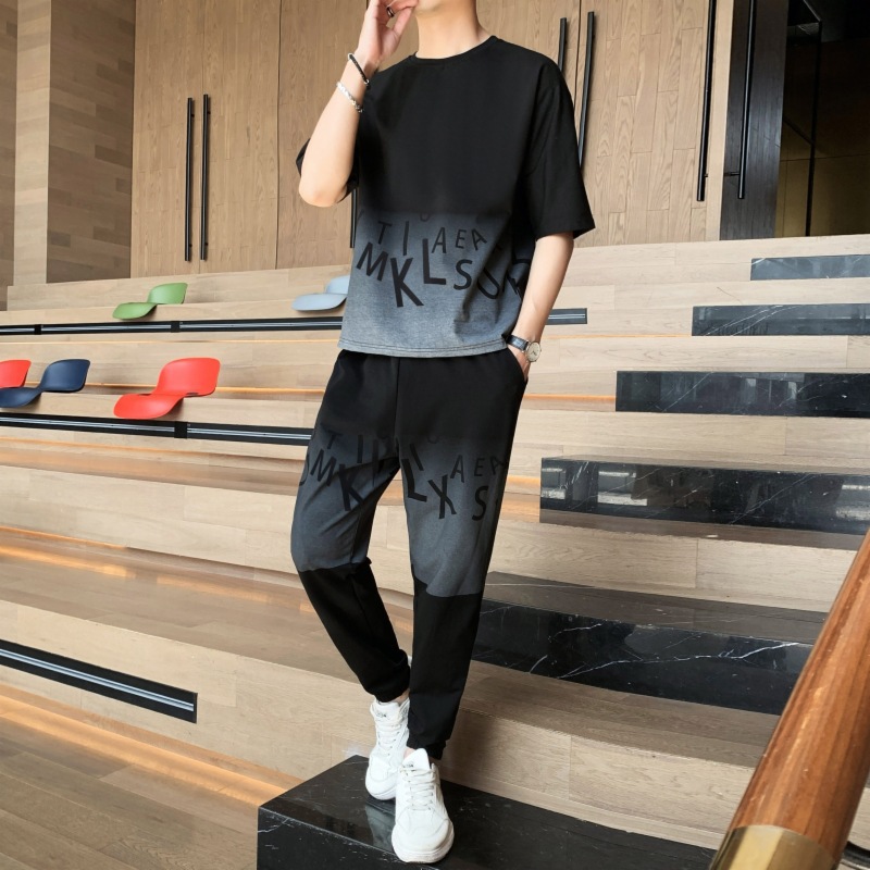 Dispositivo de deporte casual de hombre marca de moda camiseta de cuello redondo manga corta versión suelta de dos piezas conjunto de pies nueve puntos