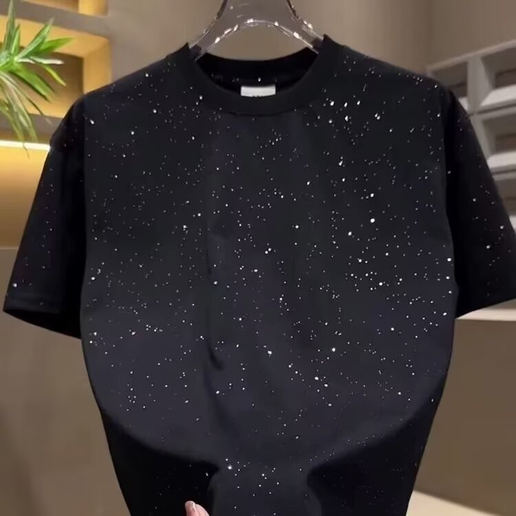 Verano de moda europea en la marca de moda 2026 nuevo hombre camiseta de manga corta con sequillas