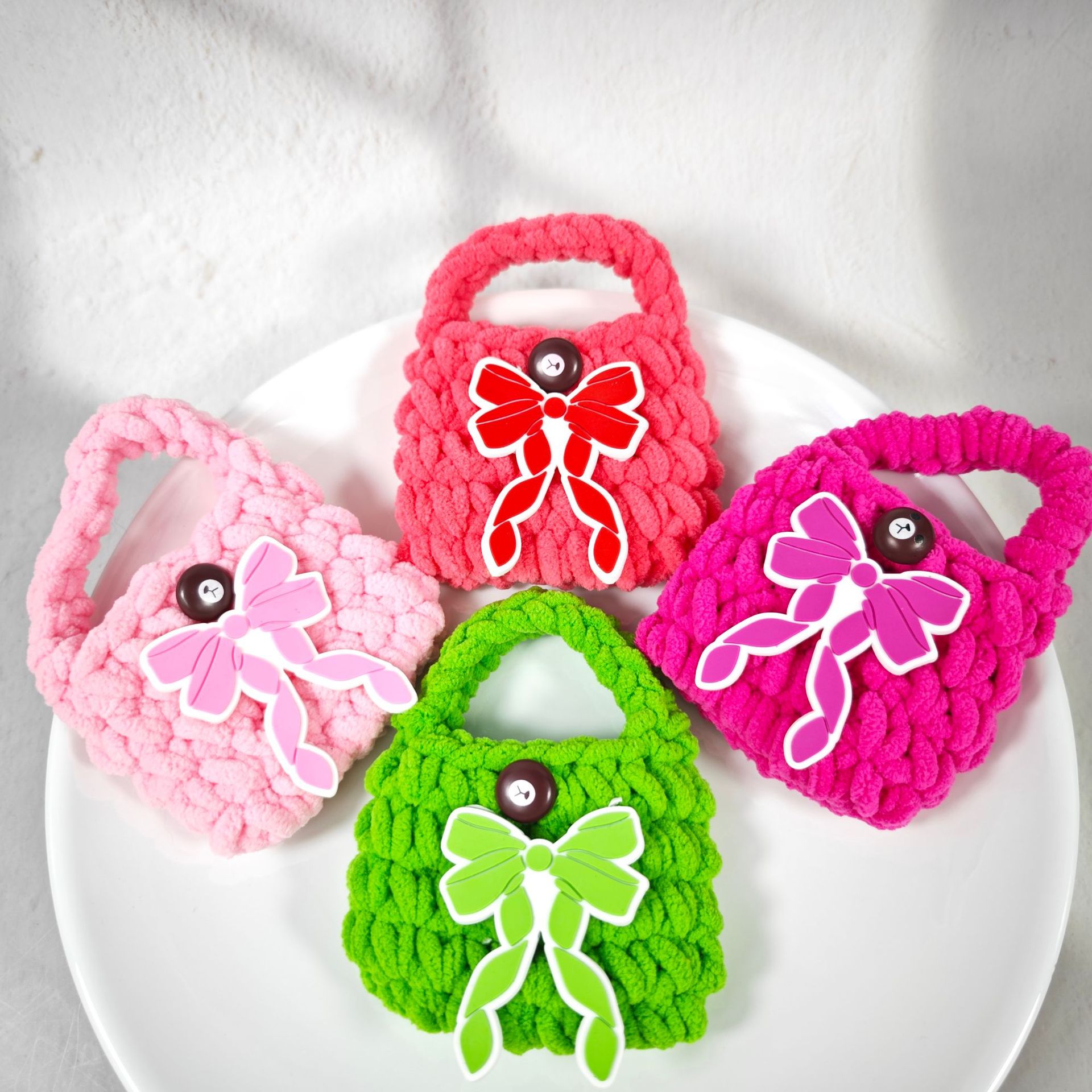 Nuevo lindo oso regalo tipo arco bolsas de auriculares de punto bolsas de cambio de color sólido bolsas de cambio de peluche