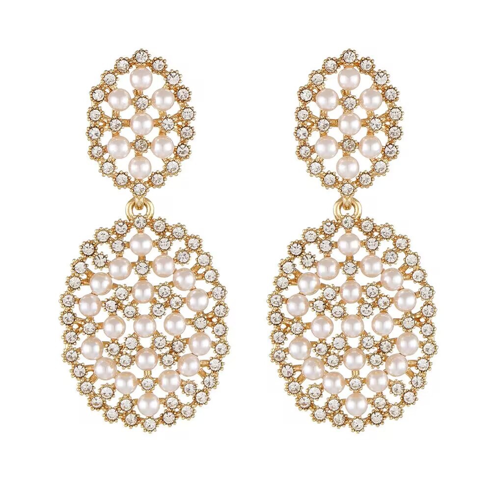 capacious earrings from pearl