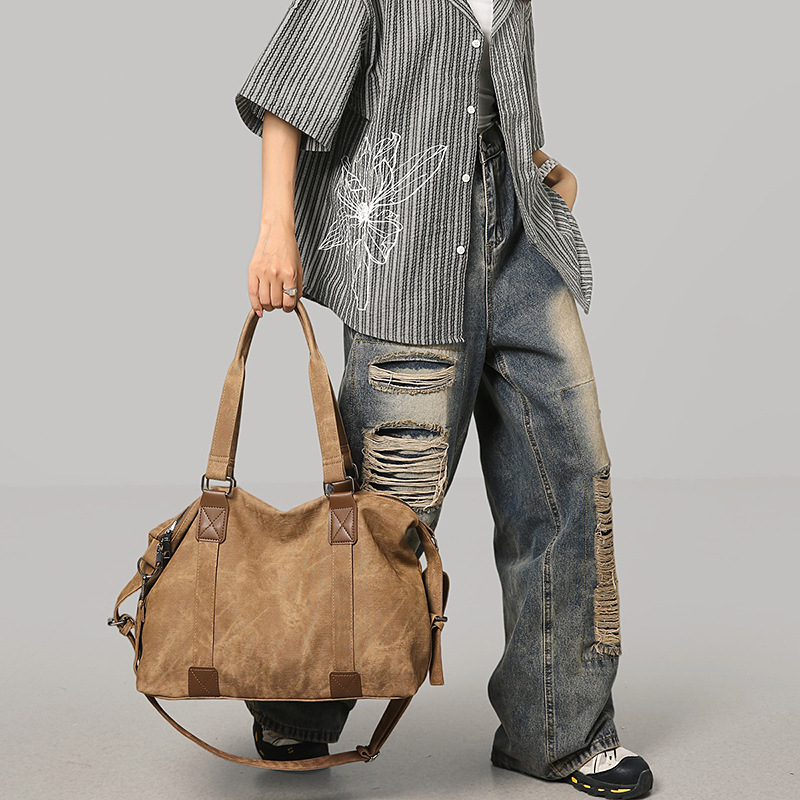 Meilad retro alta sensación bolso de gran capacidad de viaje corto bolso de mano casual versátil mochila de hombro