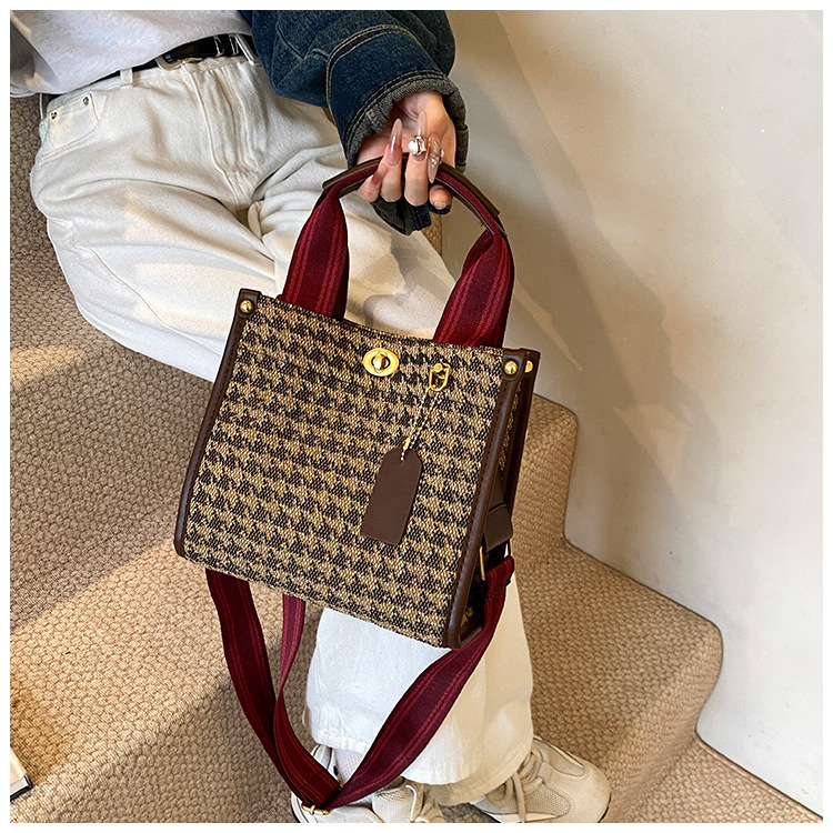 Bolso de patrón leopardo para mujeres 2026 nueva moda retro transfronteriza bolsa de viaje bolsa de tela de bloqueo mochila de hombro
