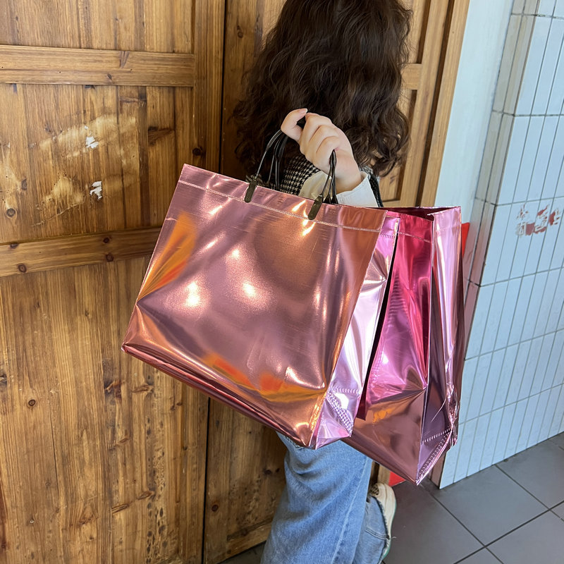 PVC colorido láser bolso de plástico transparente bolsa de regalo tienda de ropa bolsa de compras al por mayor bolsa de láser