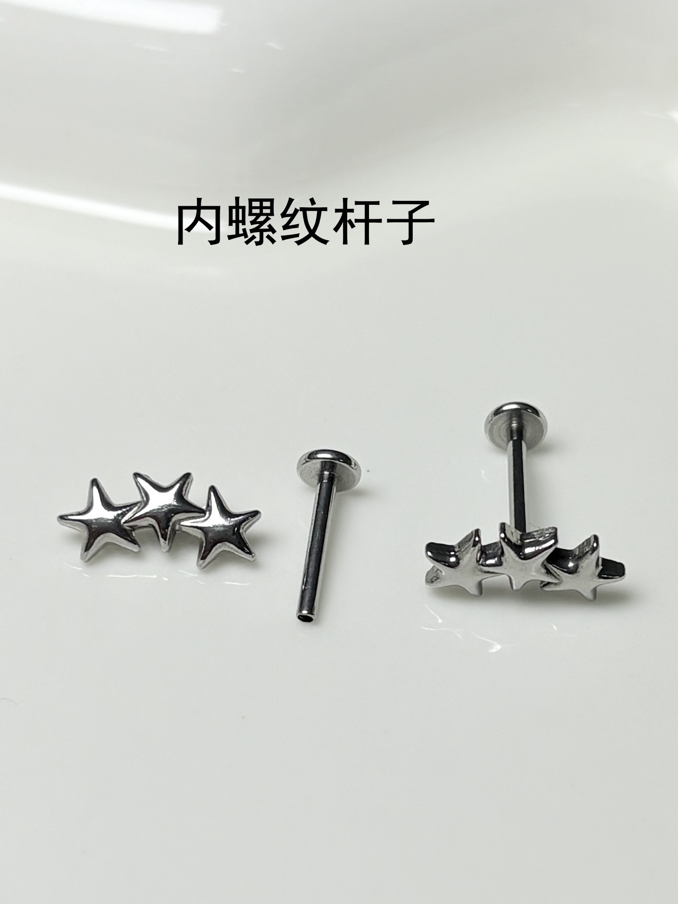 Silver pointed spike labret stud material detail