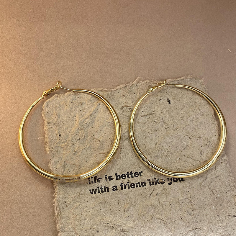 Pendientes geométricos de anillo simple de nuevo estilo transfronterizo de aguja de plata, sentido de diseño, pendientes de lujo simples y ligeros, pendientes de sentido de alta gama de moda al por mayor