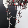 Red Zircon + Butterfly Spacer Cross Chain