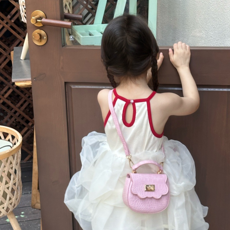 Bolso de hombro para niña de color sólido simple mini bolso de bebé lindo 2025 nuevo bolso de mensajero para niños de comercio exterior marea