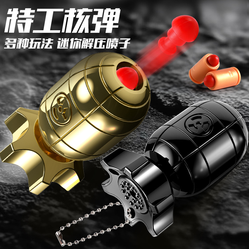 Douyin Mini Agent Boy Toy Pistola Bomba atómica Lanzamiento de carcasa Descompresión giratoria Llavero creativo Colgante al por mayor
