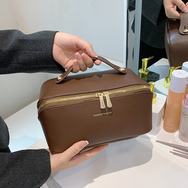 Amazon Cross-border New Litchi Pattern Metal Label Portable Cosmetic Bag Tile Cosmetic Large Capacity Storage Bag Amazon Cross-border New Litchi Pattern Metal Label Portable Cosmetic Bag Tile Cosmetic Large Capacity Storage Bag