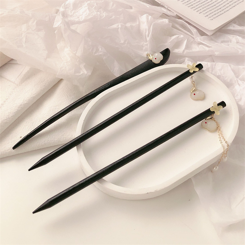 Clipper de cabello de conejo antiguo estilo femenino de alta calidad paso diario mecedor nuevo estilo chino clipper de madera clipper chino chino clipper