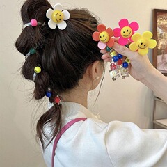 甘美な太陽の花の泡のお下げの編み物の神器は馬尾の髪の縄の2024の新型の高級感の電話線の髪の女性を刺します。