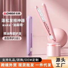 志高のトウモロコシのパーマのミニの小さい挟み板の女性は根元の髪の毛のふわふわしているトウモロコシのひげのカールの棒のチャックのトップの電気の器を敷きます。