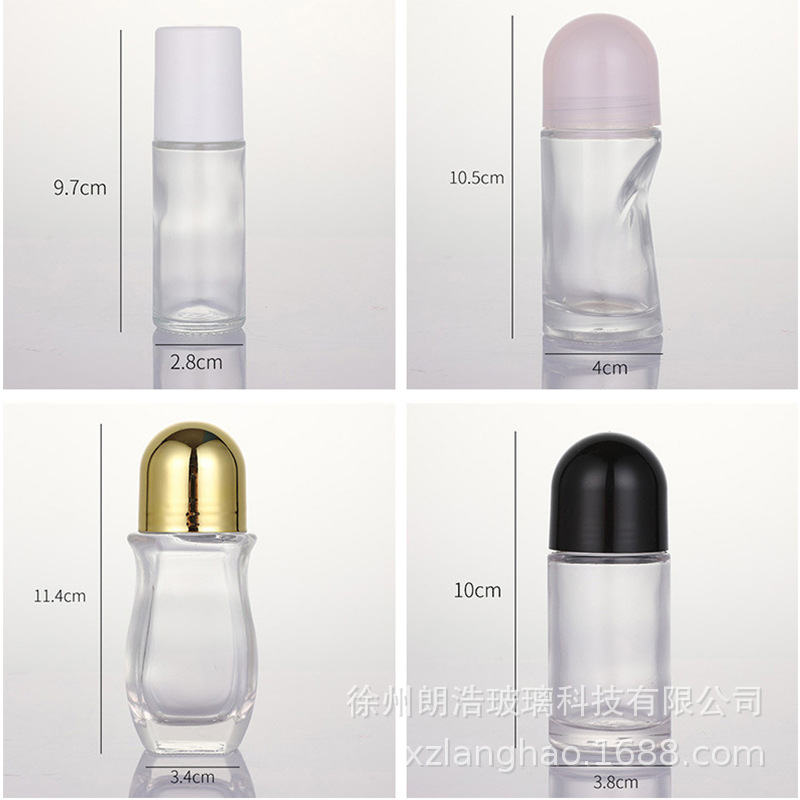 Venta al por mayor de vidrio transparente 50ml botella de bola de rodillo 30ml aceite esencial aceite de medicina cuerpo masaje botella de cuentas dolor botella grande