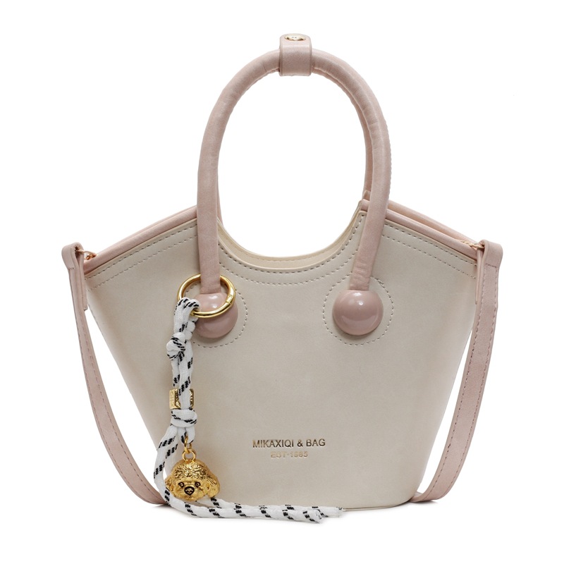 Bolsas de mano retro de color contrastante para mujeres 2025 nueva moda bolsas de hombro de estilo extranjero de alto nivel nicho bolsas de cubo