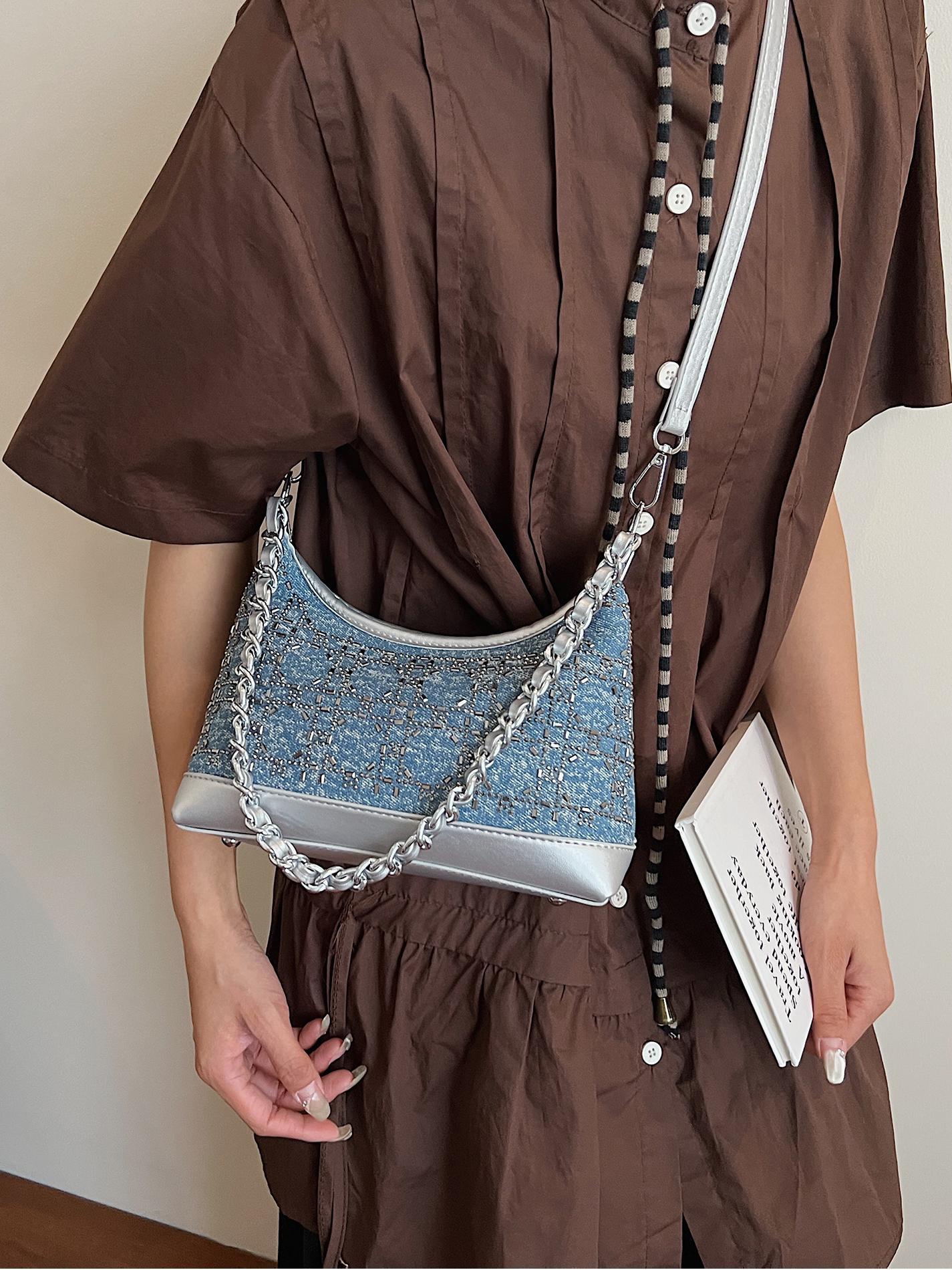 Bolso de axila de estilo occidental de moda para mujer 2025 nuevo bolso de hombro de lujo ligero de moda salvaje cadena bolso de mensajero de mezclilla