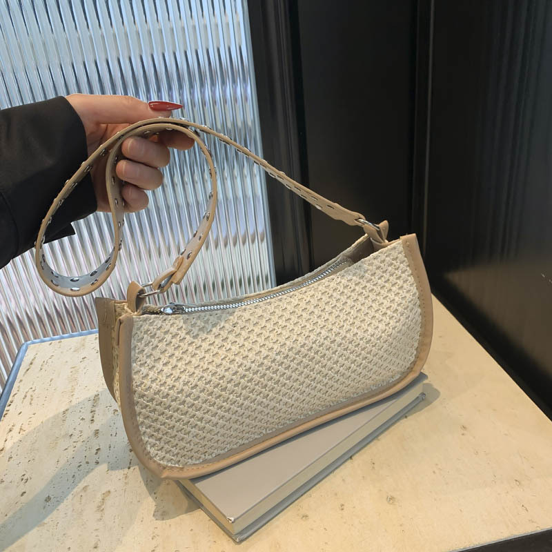 Bolsa trenzada debajo de la axila damas 2024 nuevo estilo ligero de lujo nicho de alta sensación de verano de vacaciones en la playa pastoral bolsa de paja