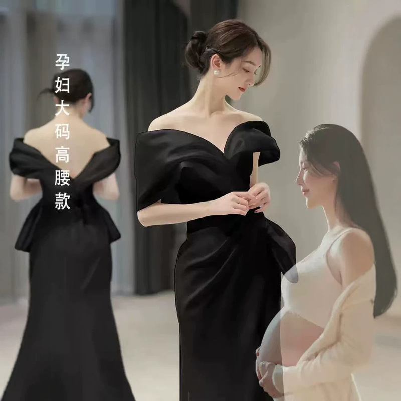 Black off-shoulder maternity evening dress, high-waisted, tummy-covering, satin fishtail plus-size dress, suitable for banquet hosting and annual meetings Black off-shoulder maternity evening dress, high-waisted, tummy-covering, satin fishtail plus-size dress, suitable for banquet hosting and annual meetings