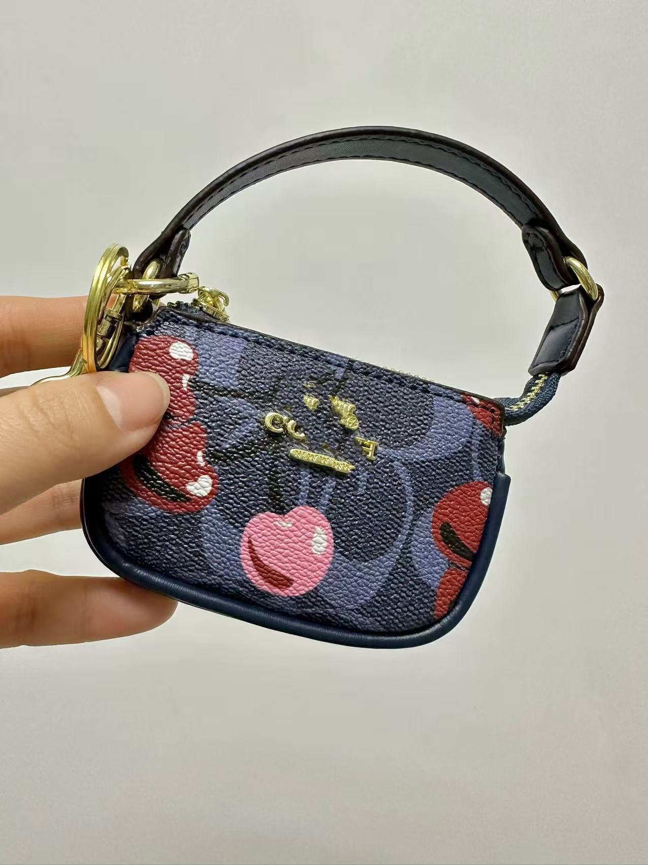 C Home Card Bag Ladies Llavero Monedero 2025 Nuevo estilo Kou Home Foreign Trade Retro Impreso Bolsa de identificación Colgante