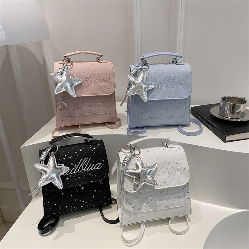 Mochila de moda coreana Full Sky Star 2026 nuevo estilo coreano estilo académico letras versátiles mochila de mano casual