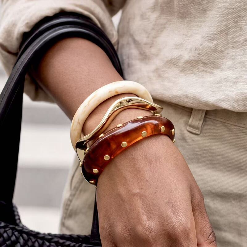 Cross-border European and American retro rivet resin bracelet set, a fashionable and stylish three-piece set for women, featuring layered bracelets and accessories Cross-border European and American retro rivet resin bracelet set, a fashionable and stylish three-piece set for women, featuring layered bracelets and accessories