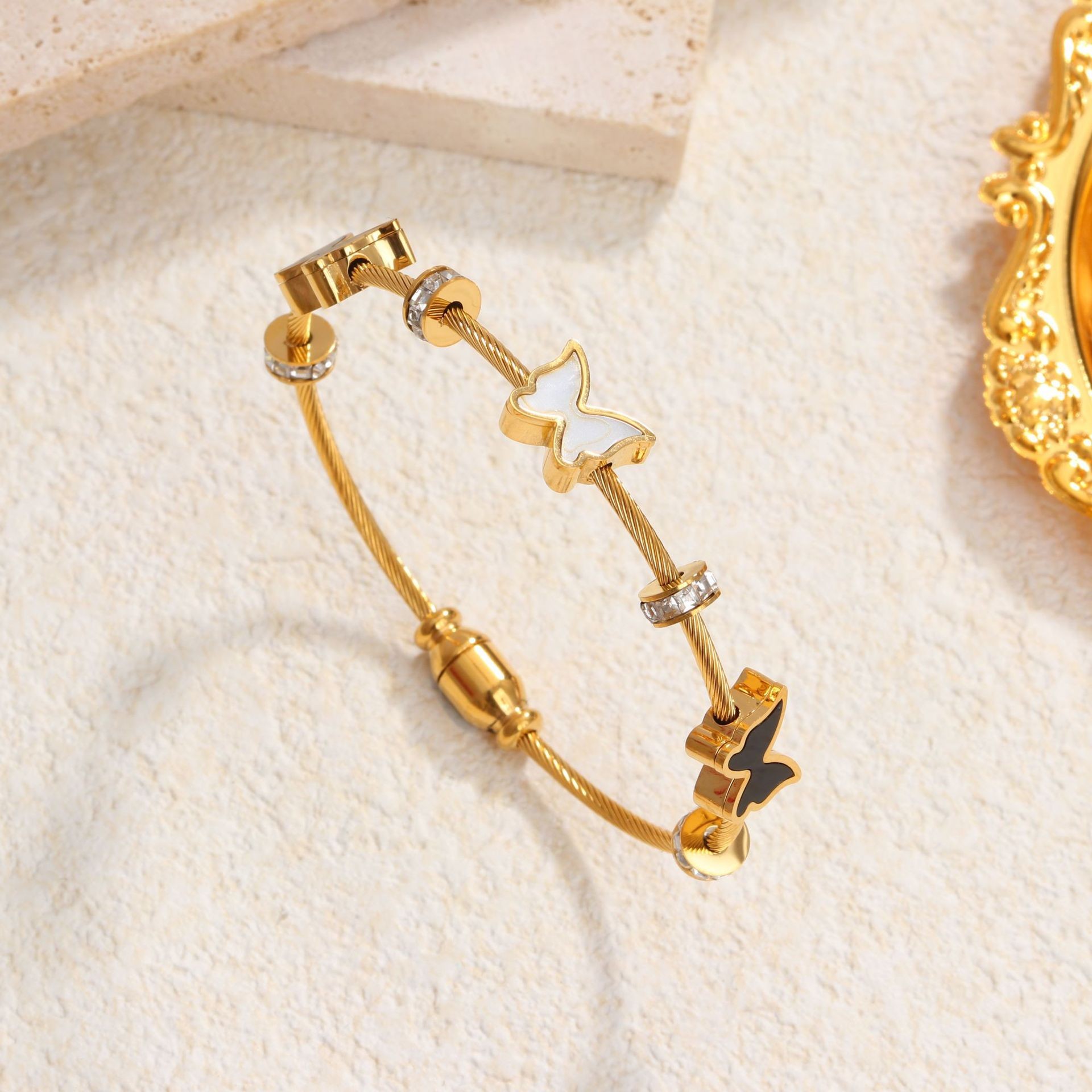 57 스틸 와이어 버터플라이 팔찌 골드