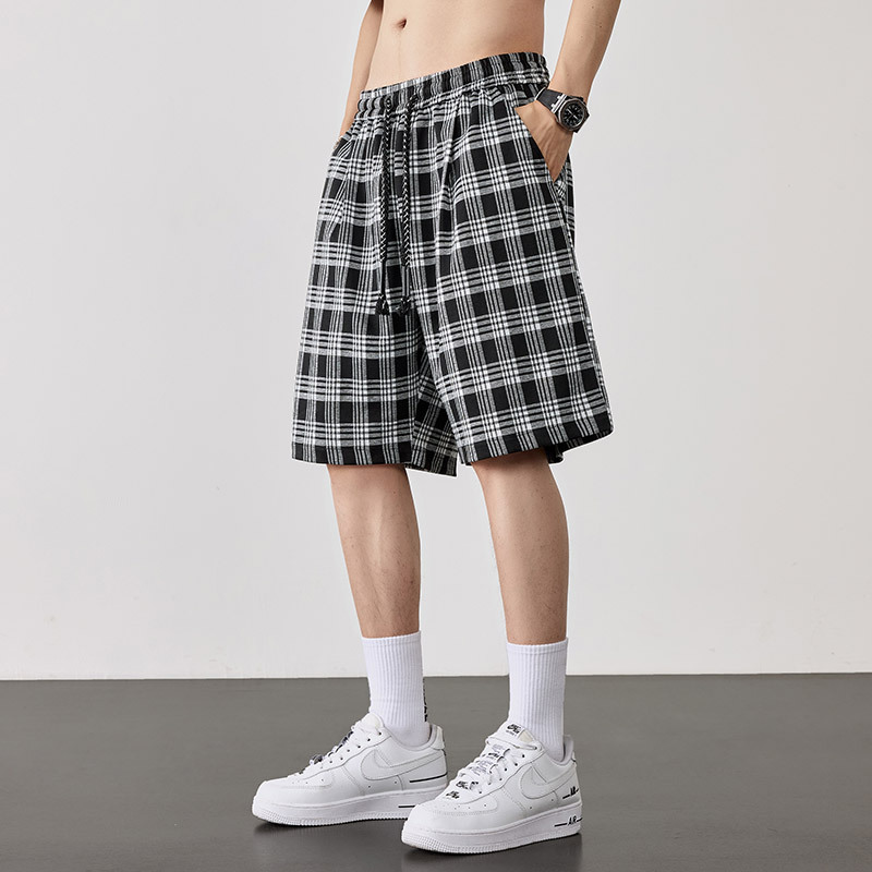 Pantalones cortos a cuadros de gran tamaño para hombres, estilo fino de verano, transpirable y suelto, estilo de Hong Kong, pantalones de cinco puntos más gordos para hombres