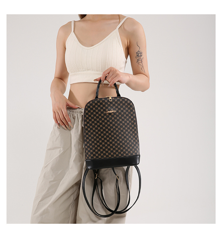 A stylish and trendy casual backpack for the 2024 autumn and winter season, featuring a large-capacity single-shoulder women's retro commuting crossbody bag undefined