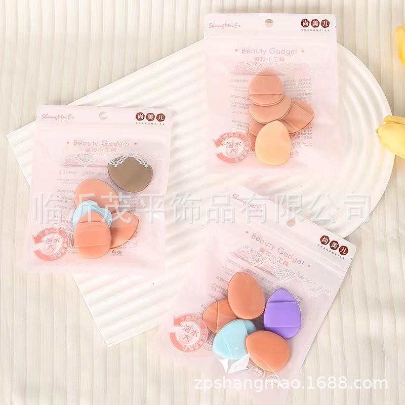 El nuevo polvo Shangmei 'er gota de agua polvo de algodón para el maquillaje ligero, ropa de vestir seco y húmedo, polvo de doble uso, cojín de aire
