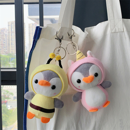 Cute penguin plush toy transforms into a dinosaur and frog catching machine, wedding celebration throwing plush doll and rag doll