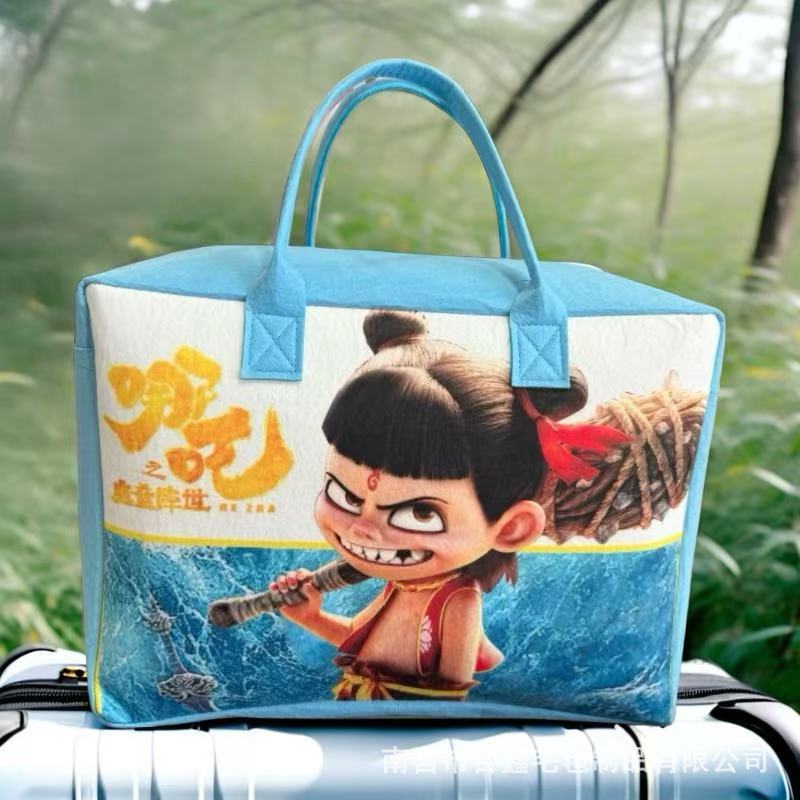 新品哪吒收纳包卡通旅行包大容量外出必备收纳袋行李包拉杆箱可套