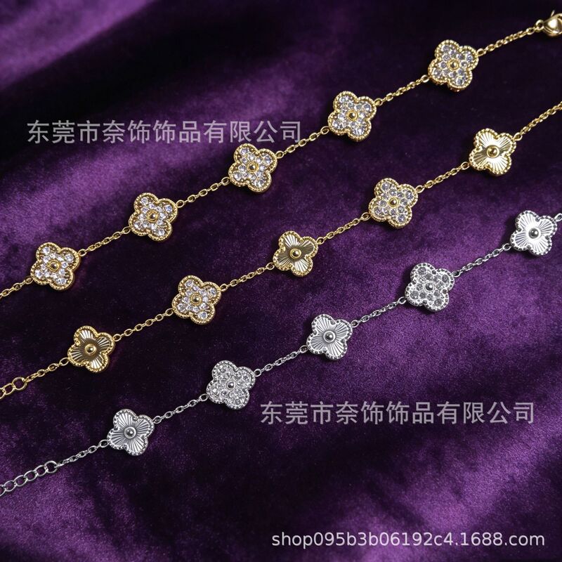 Cross-Border New Product Titanium Steel Four-Leaf Clover Bracelet with Gold-Plated Tassels and Floral Laser-Inlaid Design, Wholesale and Custom-Made for Foreign Trade Cross-Border New Product Titanium Steel Four-Leaf Clover Bracelet with Gold-Plated Tassels and Floral Laser-Inlaid Design, Wholesale and Custom-Made for Foreign Trade