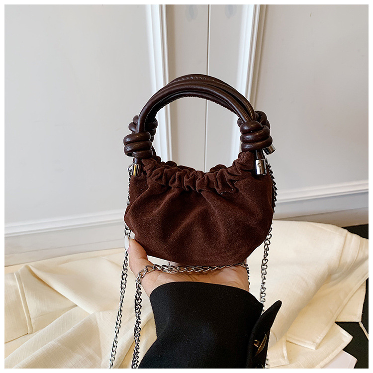 2025 nuevo bolso infantil coreano, mini bolso de ropa de bebé, bolso de hombro para hombres y mujeres, cadena de moda