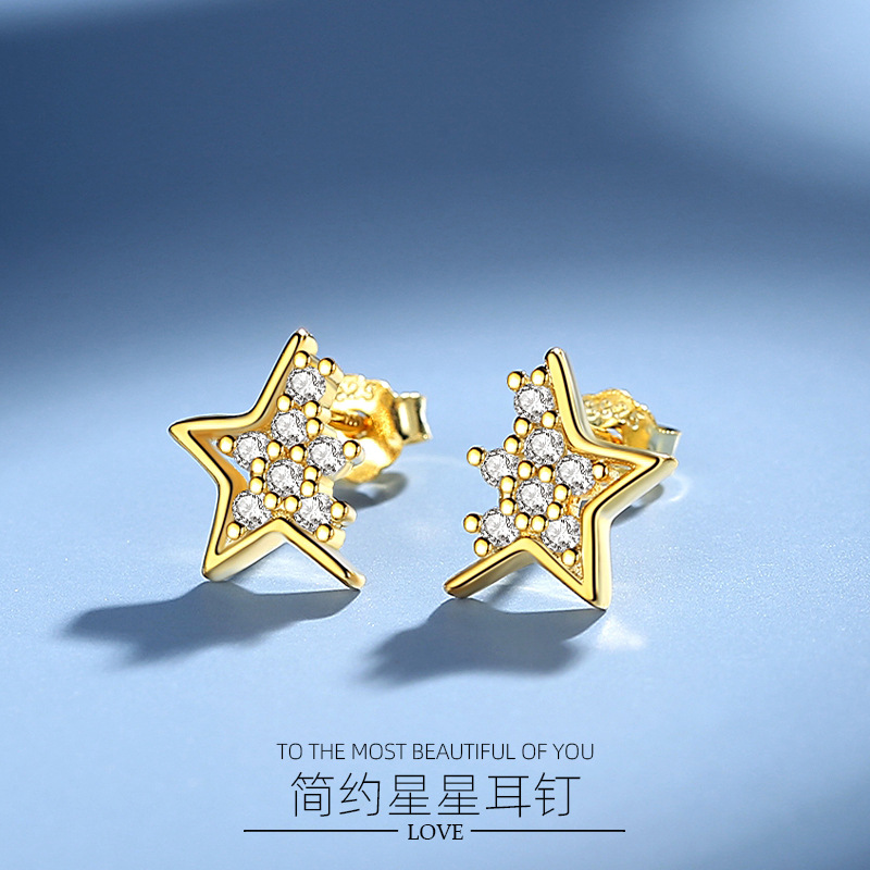 Pendientes de plata aguja femenina creativa estrellas pendientes de plata s925 al por mayor diamante diseño coreano SENTIDO DE Japón y Corea viento