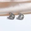 Silver ear clips with letters