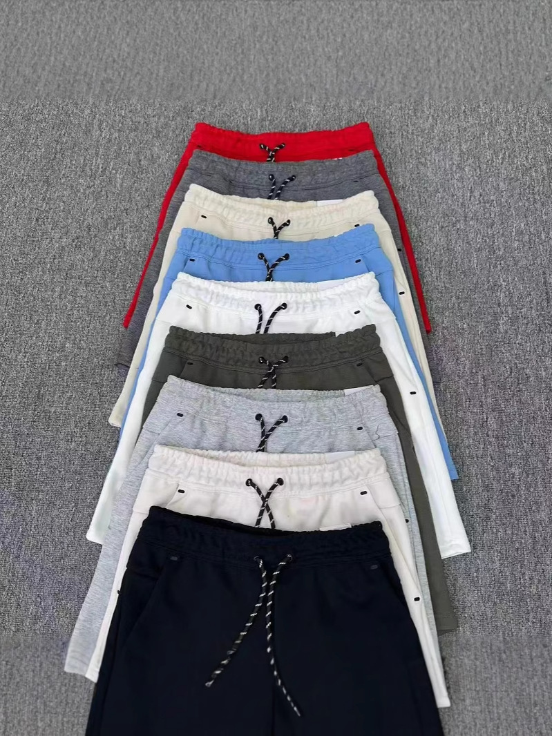 20ss cross-border N 4503 multicolor nuevo letras impresión de bolsillo de bolsillo pantalones cortos deportivos para hombres y mujeres