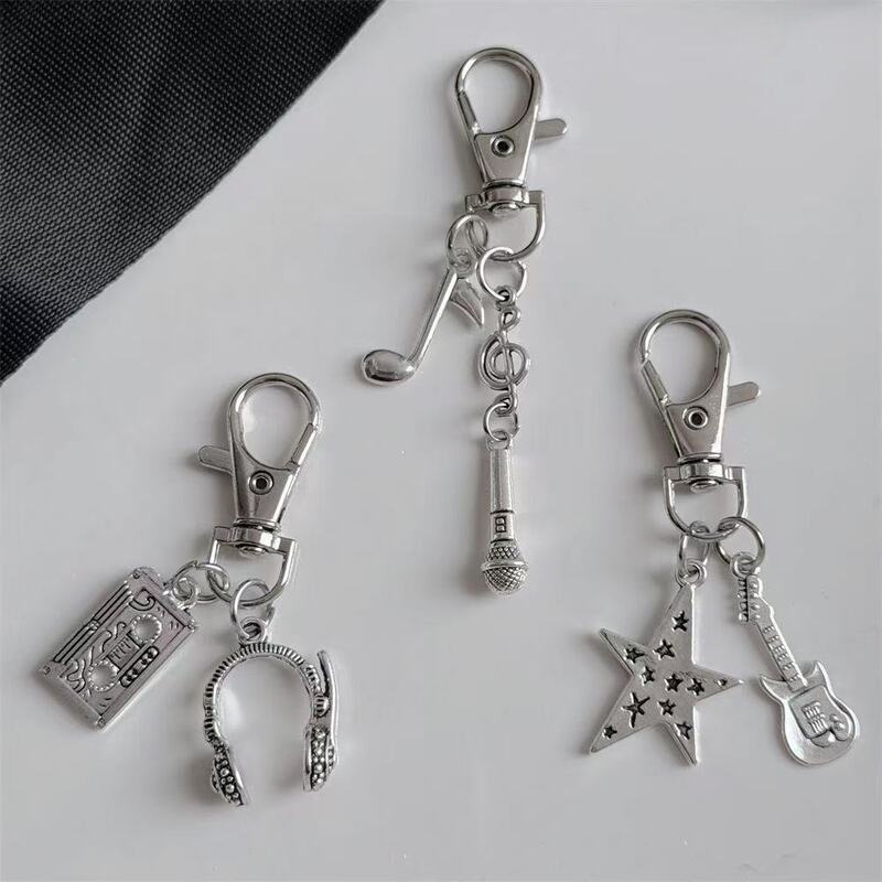 Creative Retro Mini Guitar Star Microphone Tape Headphone Musical Note Keychain Alloy Bluetooth Headphone Case Pendant Creative Retro Mini Guitar Star Microphone Tape Headphone Musical Note Keychain Alloy Bluetooth Headphone Case Pendant