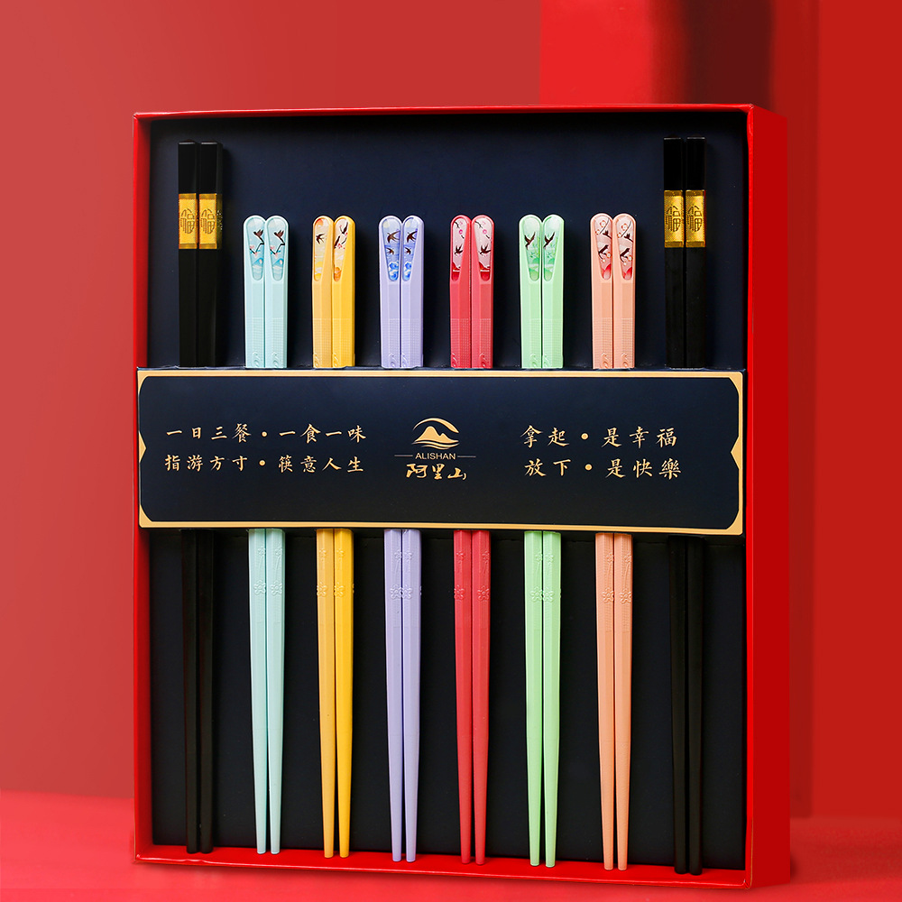 2025 nuevo juego de palillos de regalo de apertura, alitas de pollo de madera maciza para el hogar, palillos de madera, regalo de mano al por mayor, logotipo imprimible