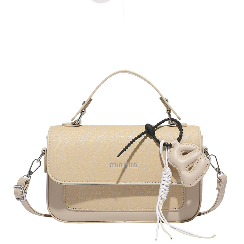 Textura al por mayor de lujo ligero bolso de mano bolso de mujer otoño 2025 nuevo estilo extranjero empalme bolso de hombro bolso de viaje