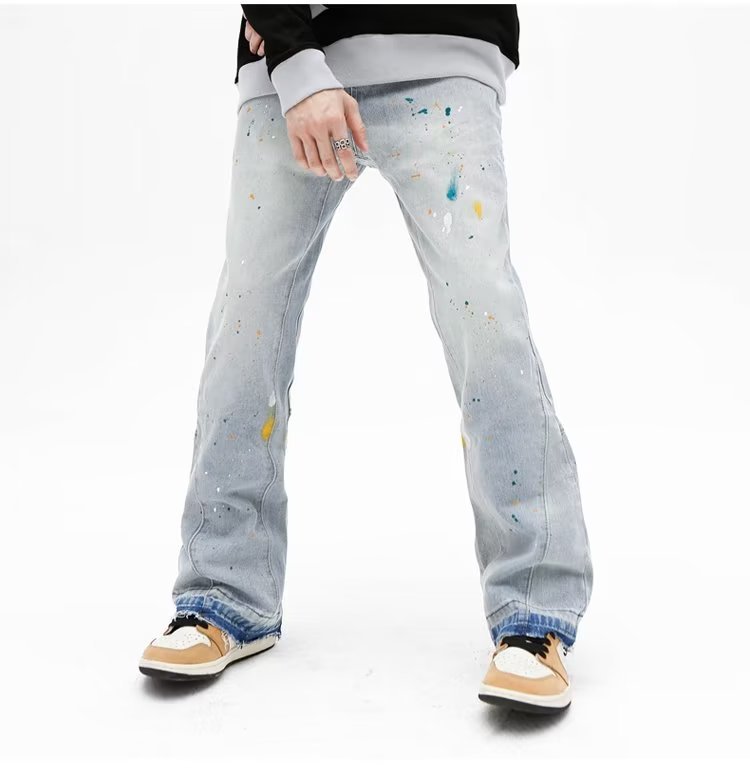 Jeans uomo slim fit stretch con strappi e taglio micro flare_voghion.com