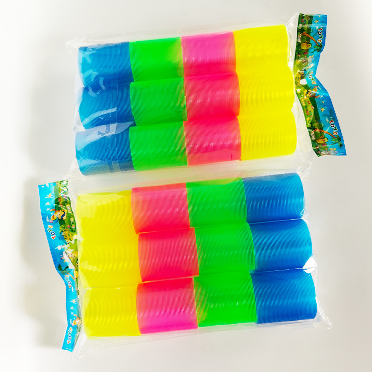 Mágico arco iris anillo mini cara sonriente 3.2x3.5CM plegable colorido bobina fábrica de juguetes para niños al por mayor