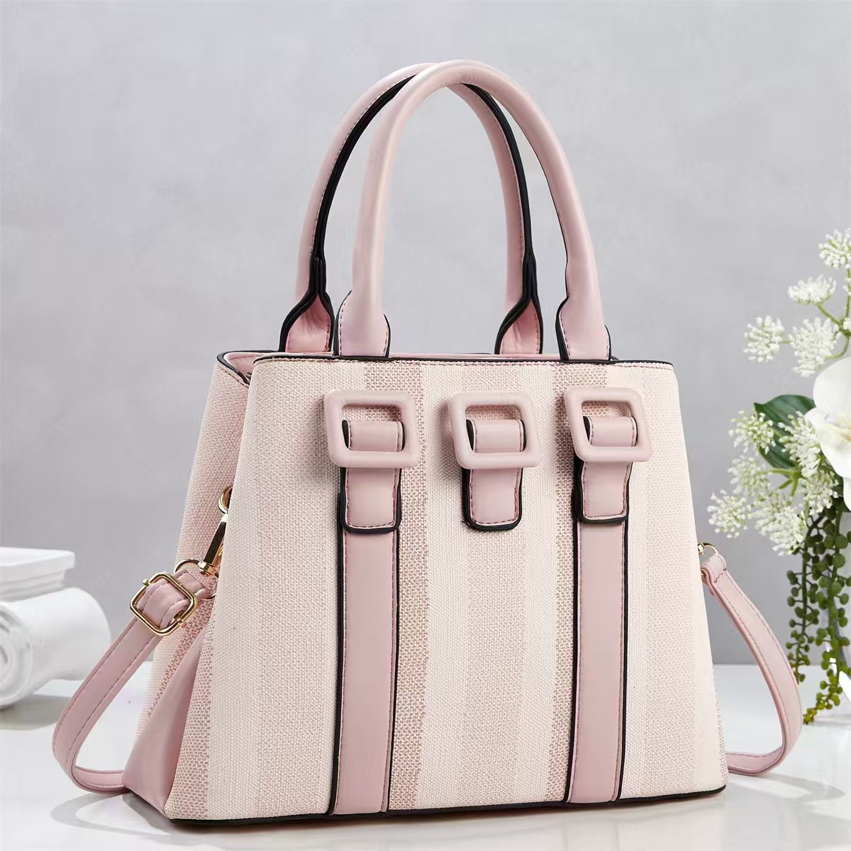 Bolsa de mano casuales a rayas simples temperamento de moda bolsas de hombro de viaje diario versátil mochila bolsas transfronterizas