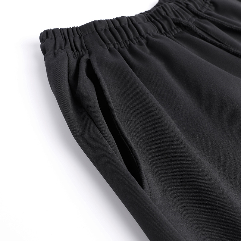 2022 nuevos pantalones casuales de color sólido de primavera y otoño pantalones casuales atados al tobillo pantalones casuales deportivos versátiles de moda para hombres en stock