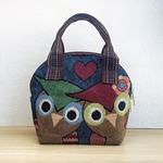 新款民族风帆布包包中年女刺绣提花外出通勤手机零钱贝壳形手提包