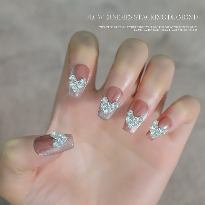Love bowknot aleación manicura pila de diamantes productos terminados celebridades de Internet nuevas decoraciones de uñas de diamantes de pila súper flash al por mayor
