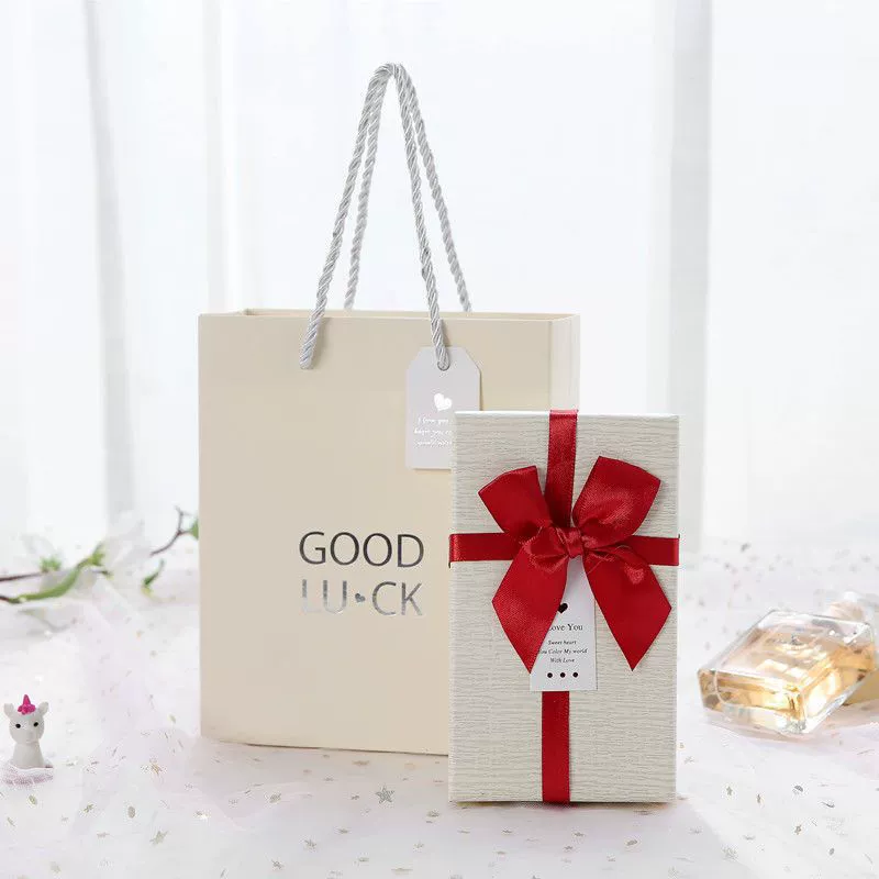 Rectangular lipstick with bow, cosmetic perfume, gift box