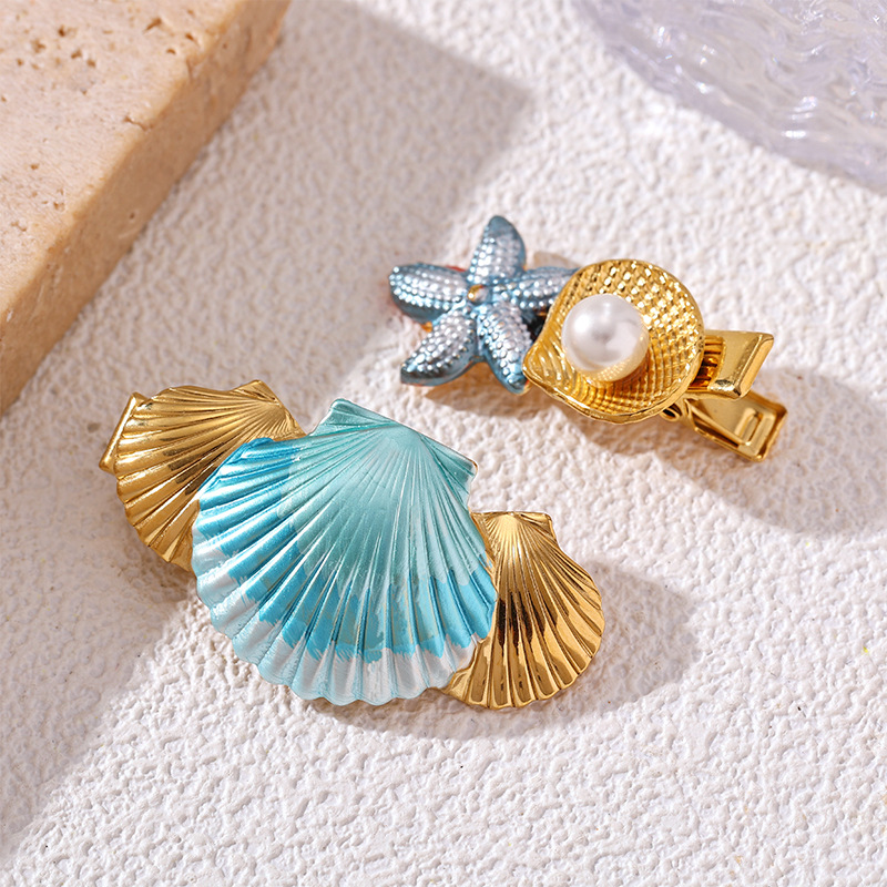 TENA Europa y los Estados Unidos nuevo estilo de vacaciones en el mar de color conchas broches de cabello de alta calidad exquisita lujosa marina al por mayor