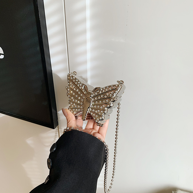 Bolsa de cena de moda mariposa para mujeres 2025 nueva cadena de diamante simple bolso de hombro mini bolso de lápiz labial de diamante