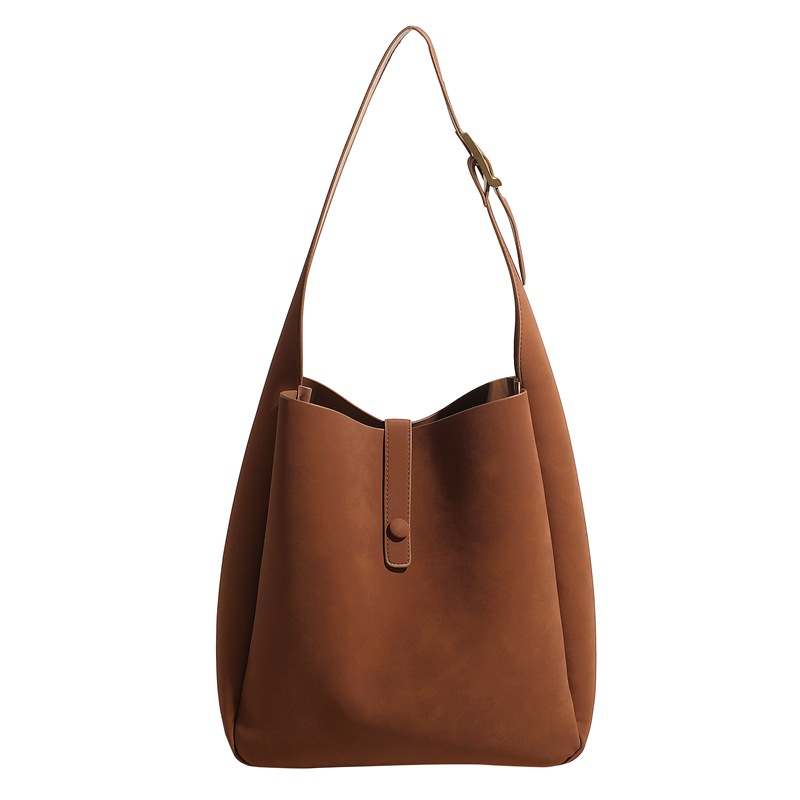 Bolsa de viaje de moda simple versátil para mujeres 2024 nuevo estilo coreano bolso de brazo de gran capacidad de hombro ancho bolso