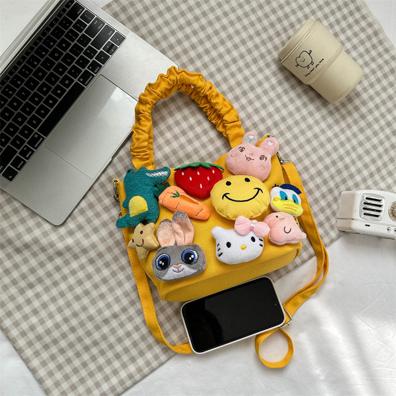 Bolsa de dibujos animados 2023 Mori linda chica fea Linda costura muñeca estilo occidental plisado bolso de hombro portátil