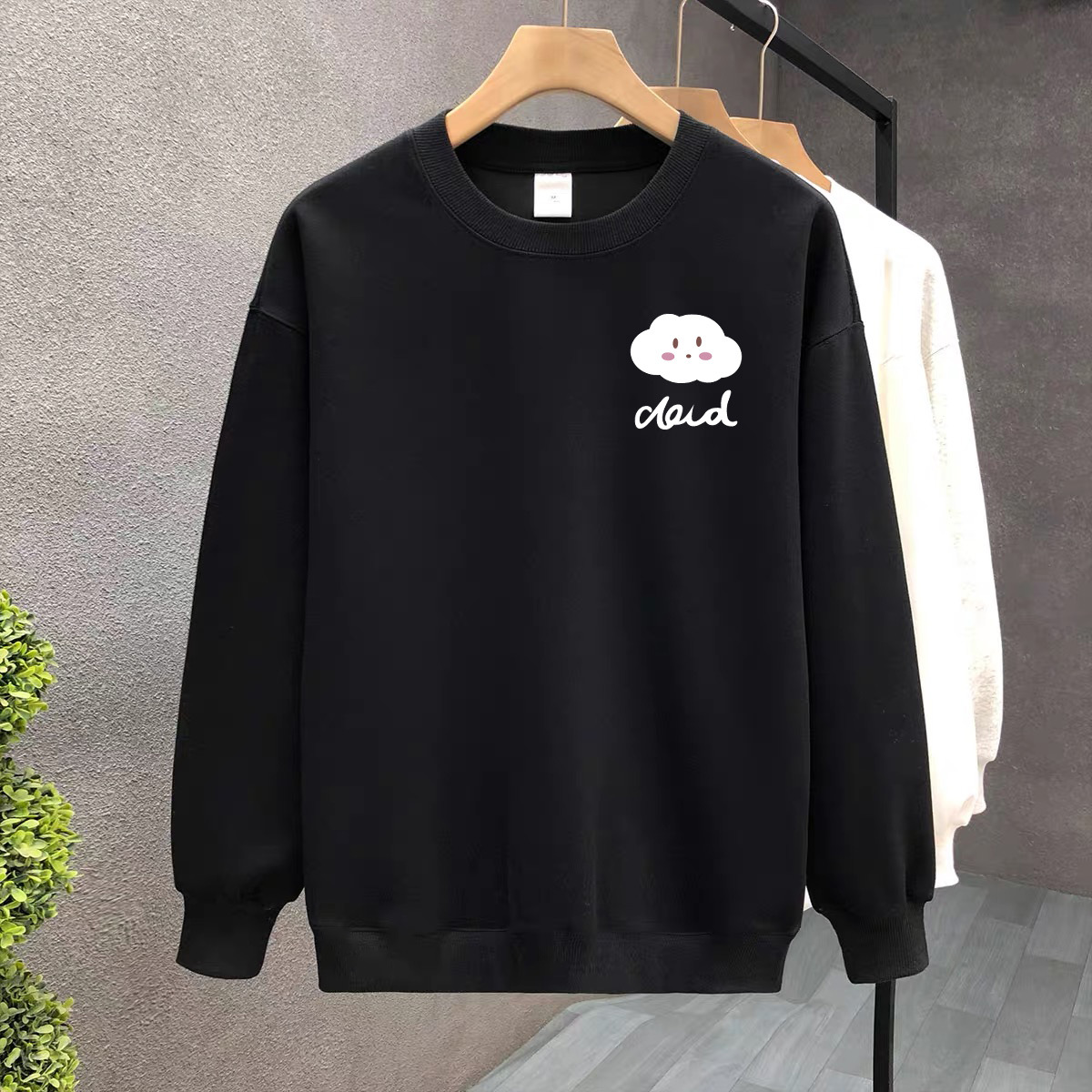 Suéter de algodón negro pesado de alta gama para mujeres 2025 otoño y invierno nuevo estilo europeo y americano camiseta de manga larga fondo suéter de estudiante